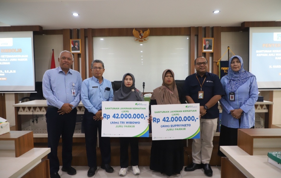 Pemkab Sleman Serahkan Santunan Kematian BPJS Ketenagakerjaan kepada Ahli Waris Pengelola Parkir 
